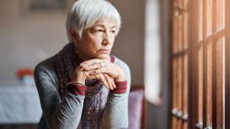 Shot of a senior woman looking thoughtful in a retirement home